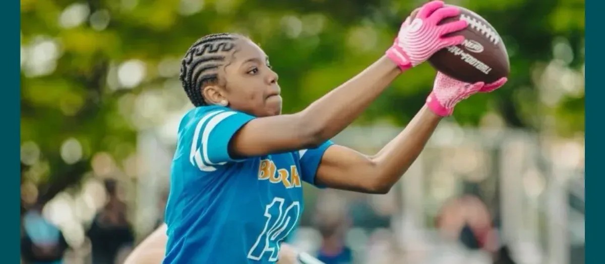 Aziyah, a 16-year-old honor roll student and flag football MVP, benefits from a Pennsylvania EITC scholarship at West Catholic High School